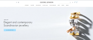 Gerog Jensen Banner showing three fusion rings on the right hand side and text on the left side saying Elegant and contempoprary Scandanavian jewellery